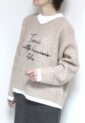 アンカルネ（Un carnet）カットソー重ね着風ロゴ刺繍プルオーバー／ベージュ×ブラック×オフ