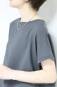 ディニテコリエ(Dignite Collier）裾切替プルオーバー／チャコール